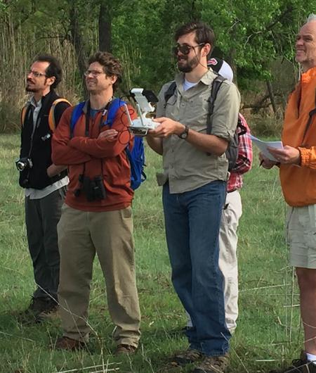 University of Oklahoma researchers observe a DJI Phantom 3 UAS in flight at Green Valley Farms Living Laboratory. Photo: GVFLL
