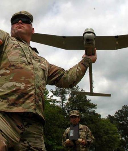 A soldier uses a small drone in a new Army training course. Photo: U.S. Army