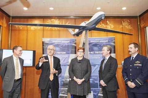 Northrop Grumman and Australian officials at a ceremony marking a Triton sale. Photo: Northrop Grumman Northrop Grumman and Australian officials at a ceremony marking a Triton sale. Photo: Northrop Grumman