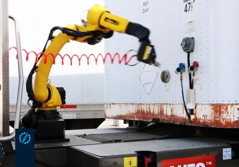 Robotic arm connects glad hand to enable air break system. Photo: PRWeb