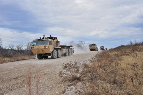 U.S. Army trucks equipped with Lockheed Martin's AMAS technology undergo an autonomous driving test at Fort Hood, Texas, in 2014. Photo courtesy of Lockheed Martin.