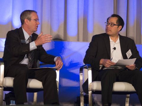 AUVSI's Wynne talks with DOT's Kan at the FAA UAS Symposium. Photo: AUVSI