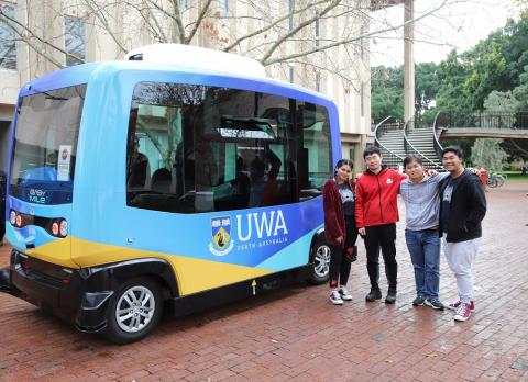 University of Western Australia students with the university's driverless bus. Photo: University of Western Australia