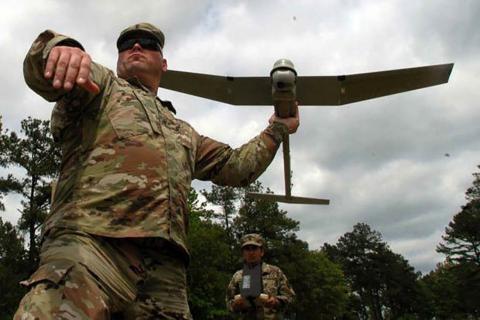 A soldier uses a small drone in a new Army training course. Photo: U.S. Army