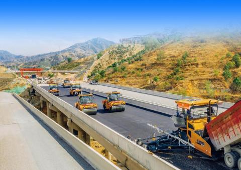 Fleet of XCMG Autonomous Road Rollers Completes the World's First Asphalt Road Construction - Panda Expressway between Sichuan and Yunnan Province. Photo: PRNewswire